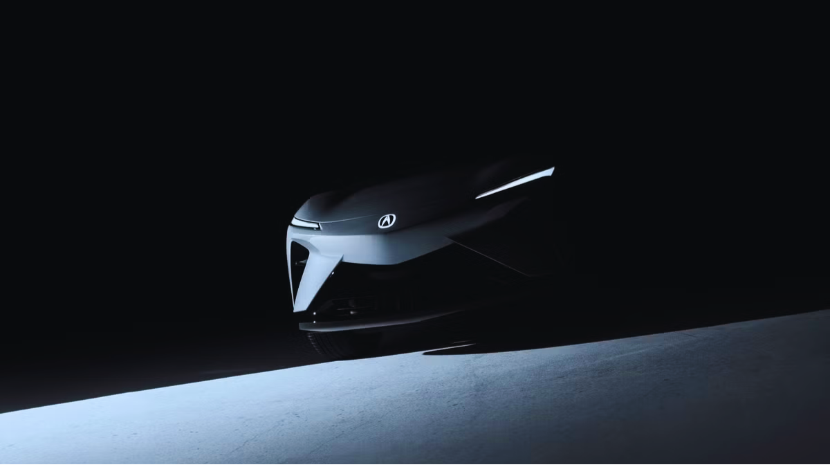 Front view of the Acura RSX Prototype EV with illuminated badge and slim LED lights