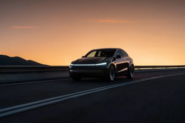 Tesla Model Y with futuristic city skyline at sunset, highlighting EV tax credit deadline and price increase news